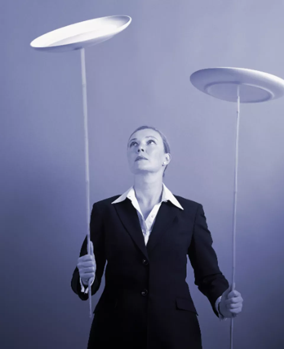 Businesswoman Spinning Plates